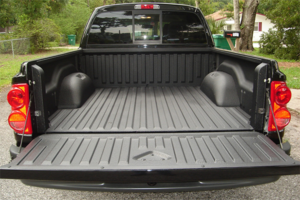 Exiled Artistry Spray-On Bedliner Services for trucks, jeeps, trailers, and industrial applications in Marshall, NC